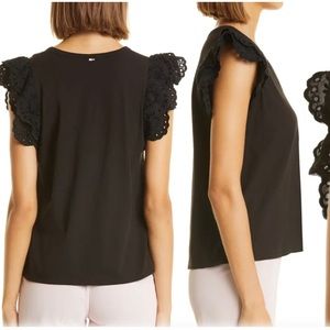 Boss T-shirt 
Eyelet sleeves flutter and frame this otherwise simply styled.